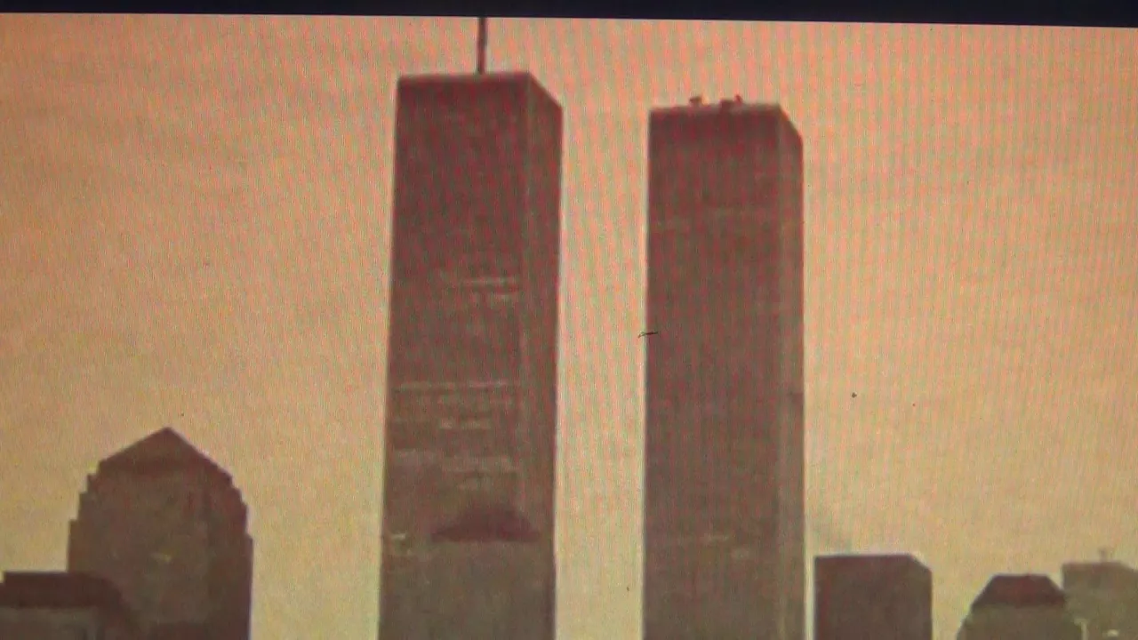 Hollywood Indoctrination Machine showing two Birds Flying into the Twin Towers of the WTC