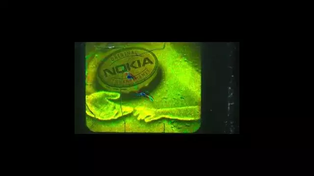 Nokia Alien Technology ET Hand giving the Knowledge to Mankind to buy our Souls through Comfort