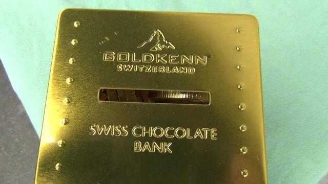 La Suisse est une Dictature Enrobé du Chocolat au Lait  - - - - - travail infantil