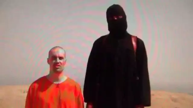 James Foley Scam shows green US Farmland Horizon behind Jesuit Fake Decapitation-Beheading