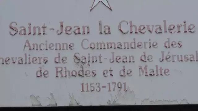 What's a Swiss Cross doing on the Templar's Commandery of Puy-en-Velay in France?